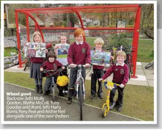  ??  ?? Wheel good Back row (left) Molly Gordon, Blythe McColl, Toby Goodier and (front, left) Harry Burns, Rory Peel and Archie Neil alongside one of the new shelters