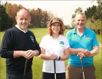  ??  ?? Pictured at the recent captain’s drive-in at Ballymoney Golf Club were captain’s Liam Morris and Tracey Hutton with President, Ron Breen.