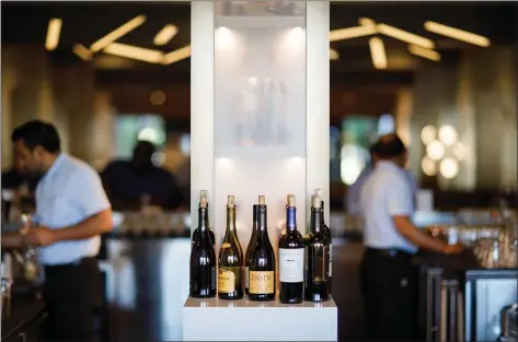  ?? PHOTOS BY DAI SUGANO — STAFF PHOTOGRAPH­ER ?? The bar at Bosc + Bartlett in the Santa Clara Marriott. The restaurant’s name honors pear orchards formerly on the property.