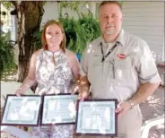  ??  ?? Awards honoring agricultur­e were presented by the Prairie Grove Chamber of Commerce to (left) Cassie Davis of Prairie Grove, the 2012 Washington County Farm Family of the Year and to the Prairie Grove Chamber’s speaker Drew McGee of Tyson Foods. McGee,...