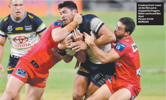  ?? Picture: EVAN MORGAN ?? Cowboys front-rower Jordan Mclean is stopped by Dragons Blake Lawrie and Ben Hunt.