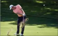  ?? COOPER NEILL — THE ASSOCIATED PRESS ?? Justin Rose hits from the fairway on the 18th hole during the third round of the Fort Worth Invitation­al golf tournament at Colonial Country Club in Fort Worth, Texas, Saturday.