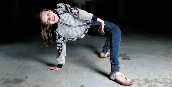  ?? LEAH HENNEL/CALGARY HERALD ?? Taylor Hatala, 12, a hip-hop dancer that has been appearing onstage with Janet Jackson, just wants to keep dancing after the tour is over.