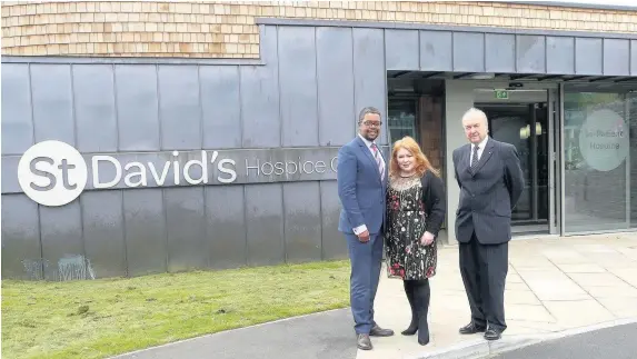  ??  ?? > Chairman Malgwgn Davies, Vaughan Gething AM and Chief Executive Emma Saysell at the opening of the new St David’s Hospice Care building in Newport