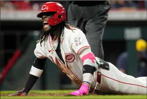  ?? JEFF DEAN — GETTY IMAGES ?? Elly De La Cruz of the Cincinnati Reds reacts after hitting an inside-the-park home run against the Milwaukee Brewers in the seventh inning at Great American Ball Park on Monday in Cincinnati, Ohio.