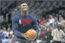  ?? MICHAEL AINSWORTH — THE ASSOCIATED PRESS FILE ?? New Orleans’ Zion Williamson shoots free throws prior to a game in March in Dallas.