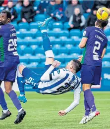  ?? ?? Kyle Lafferty scores his acrobatic winner for Killie.