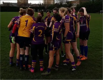  ??  ?? The Fr. Murphy’s ladies’ football team in a pre-match huddle.