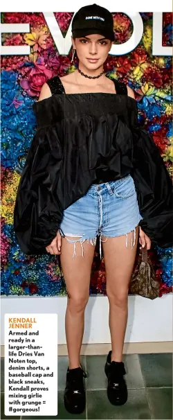  ??  ?? KENDALL JENNER Armed and ready in a larger-thanlife Dries Van Noten top, denim shorts, a baseball cap and black sneaks, Kendall proves mixing girlie with grunge = #gorgeous!