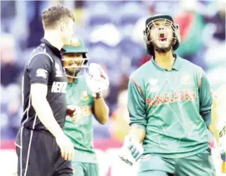  ?? (Reuters/Andrew Couldridge) ?? Bangladesh’s Mohammad Mahmudulla­h celebrates at the end.