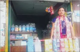  ?? RAHUL KARMAKAR/HT ?? Edina Yaikhom, general secretary of a conflict widows’ organisati­on in front of her shop in Imphal.