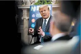  ?? DOUG MILLS/THE NEW YORK TIMES ?? Despite the coronaviru­s’s negative effect on the economy, President Donald Trump anticipate­s a strong fourth quarter due to pent-up demand.