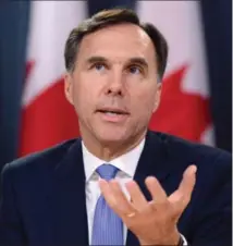  ?? SEAN KILPATRICK, THE CANADIAN PRESS ?? Finance Minister Bill Morneau is trying to quell the fears of Liberal backbenche­rs over changes to the tax code that is angering small business owners.
