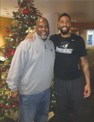  ?? Submitted photo ?? Woonsocket High graduate Walter Lindsey (left) is proud of the man his son, Providence College senior Jalen Lindsey (right), has become. Lindsey will play his final game at the Dunkin’ Donuts Center today against St. John’s at noon.