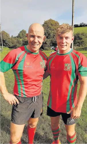 ??  ?? Son – scrum half Ben Davies, and father – replacemen­t full back Andrew Davies