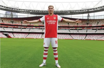  ??  ?? Emile Smith Rowe at the Emirates Stadium after signing a new Arsenal contract. Photograph: Stuart MacFarlane/Arsenal FC/Getty