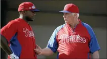  ?? MATT SLOCUM — THE ASSOCIATED PRESS FILE ?? Ryan Howard, left, is one of the many sluggers Charlie Manuel, right, has given hitting instructio­n to over the years.