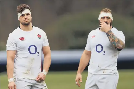  ??  ?? England’s Jack Clifford and Joe Marler during training session at Bagshot yesterday