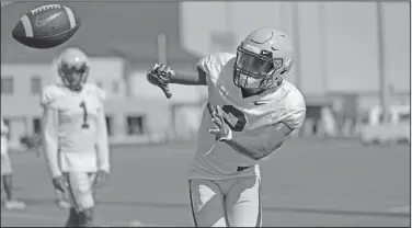  ?? Associated Press ?? Focused: LSU wide receiver Justin Jefferson (2) works out during practice in Baton Rouge, La., earlier this month. The Tigers enter 2019 with high expectatio­ns after winning 10 games last year that also included a Fiesta Bowl win.