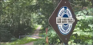  ??  ?? This sign points out an entrance to the Airline Trail in Pomfret, Conn.