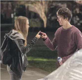  ?? MICHAEL TACKETT/ 20TH- CENTURY FOX/ THE ASSOCIATED PRESS ?? Cara Delevingne, left, as Margo and Nat Wolff as Quentin, go on a night of wild adventures together in John Greene’s Paper Towns.