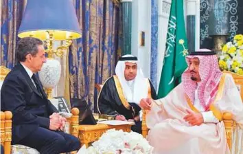  ?? AFP ?? Saudi king Salman Bin Abdulaziz (right) with former French president Nicolas Sarkozy in the capital Riyadh yesterday.