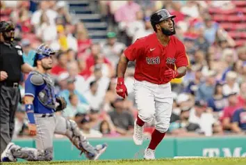  ?? Elise Amendola / Associated Press ?? Boston's Danny Santana watches his three-run homer in front of Kansas City Royals catcher Sebastian Rivero in the fourth inning Thursday.