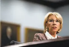  ?? Erin Schaff / New York Times ?? The changes announced by Education Secretary Betsy DeVos reshape the way schools respond to sexual misconduct.
