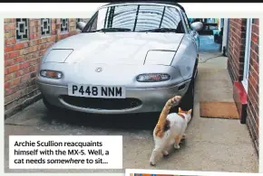  ??  ?? Archie Scullion reacquaint­s himself with the MX-5. Well, a cat needs somewhere to sit...