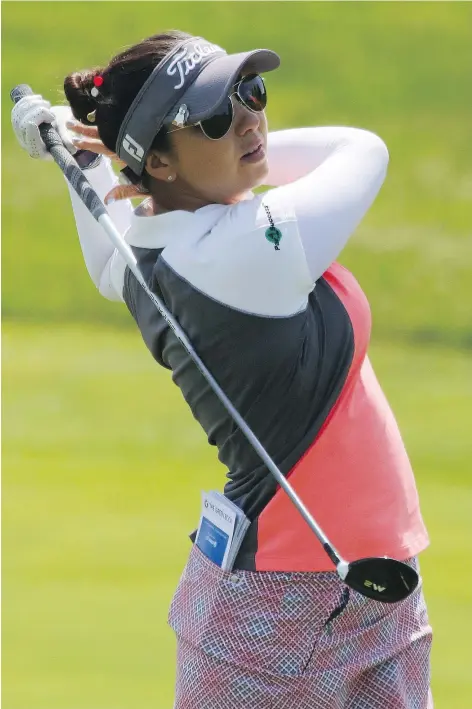  ?? — CP FILES ?? Brittany Marchand of Orangevill­e, Ont. hits a shot during the LPGA Classic at Whistle Bear Golf Club in Cambridge, Ont. She was in the field on a sponsor’s exemption, finishing in a tie for 46th.