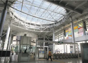  ?? Photos by Lea Suzuki / The Chronicle ?? Milpitas’ BART Station, the centerpiec­e of a 437acre “transit area” plan, includes a skylit central court.