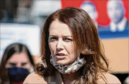  ?? Eduardo Munoz Alvarez / Associated Press ?? Lindsey Boylan, a former state economic developmen­t adviser for Gov. Andrew M. Cuomo, speaks at a March 20 rally in New York City’s Washington Square Park calling for his impeachmen­t.