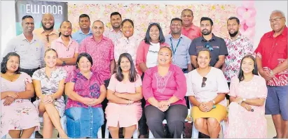  ?? Picture: SUPPLIED ?? New Door Real Estate staff members with guests at their Pinktober celebratio­n.