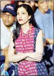  ??  ?? Long time Hillary Clinton staff member Huma Abedin waits while the Democratic presidenti­al nominee greets supporters after holding a rally with Vice-President Joe Biden at Riverfront Sports athletic facility on Aug 15 in Scranton, Pennsylvan­ia.
(AFP)