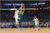  ?? MATT SLOCUM/AP ?? The Boston Celtics’ Jayson Tatum goes up for the go-ahead shot against Philadelph­ia 76ers’ Anthony Melton during the final seconds Saturday night.