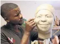  ?? Pictures: Jackie Clausen ?? Wax sculptor Lungelo Gumede working on his sculpture of Nkosazana Dlamini-Zuma. Below, Gumede with his sculptures of Jacob Zuma and Cyril Ramaphosa, and left, holding a cast of Madiba.