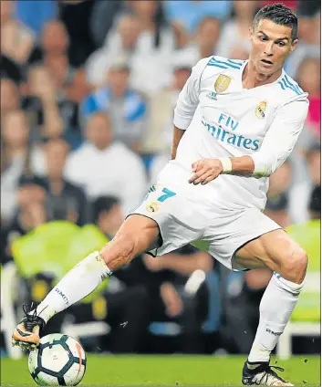  ?? Picture: AFP/GABRIEL BOUYS ?? PROLIFIC SCORER: Real Madrid's Cristiano Ronaldo on the ball