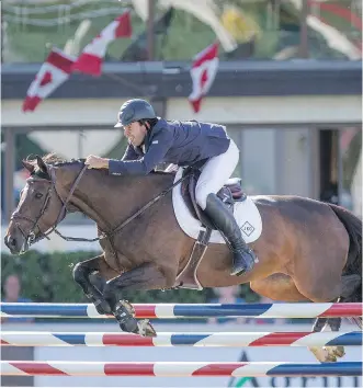  ?? ARYN TOOMBS/ CALGARY HERALD ?? Friday at Spruce Meadows, Jack Hardin Towel Jr. won the $35,000 Encana Cup aboard Emilie De Diamant AS. The horse is owned by Jennifer Gates, daughter of U.S. billionair­e Bill Gates.
