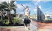  ??  ?? Fort Lauderdale Battalion Chief Garret Pingol plays Taps during the dedication ceremony for the Riverwalk 9-11 Monument last year.