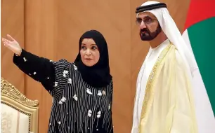  ?? Photo by Ryan Lim ?? Shaikh Mohammed bin Rashid exchanges views with Dr Amal Al Qubaisi during the Federal National Council session in Abu Dhabi on Sunday. —