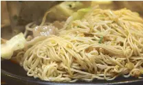  ??  ?? Something new: Tonkotsu Yaki Fried Ramen is Dohtonbori’s tonkotsu ramen cooked on a teppan.