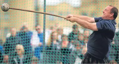  ?? Pictures: Kris Miller. ?? Show of strength: a competitor at St Andrews Highland Games.