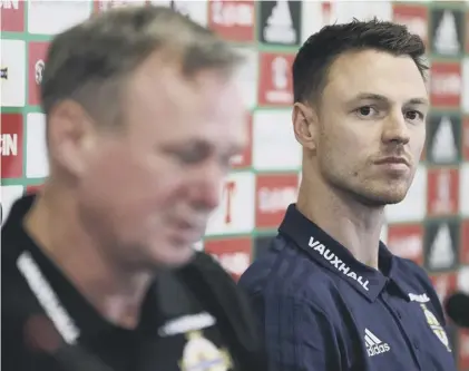  ??  ?? 2 Jonny Evans addresses the media alongside manager Michael O’neill, left, ahead of the twolegged World Cup play-off against Switzerlan­d.