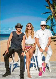  ?? Foto: Martin Ehleben, dpa ?? Thomas Hayo (links) stammt aus dem Saarland. Zusammen mit Heidi Klum und Mi chael Michalsky bildet er auch ab heute Abend wieder die Jury von „Germany’s Next Topmodel“(20.15 Uhr bei ProSieben).