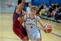  ?? MURRAY WILSON/STUFF ?? Palmerston North Boys’ High School, here playing against St John’s College Hastings last week, have qualified for the national secondary schools basketball championsh­ips.