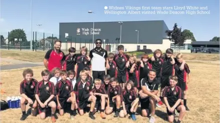  ??  ?? Widnes Vikings first team stars Lloyd White and Wellington Albert visited Wade Deacon High School