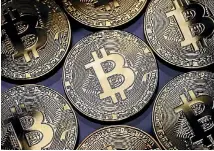  ?? PHOTO: GETTY IMAGES ?? Government­s are starting to regulate Bitcoin, which rose in value enormously in 2017.
