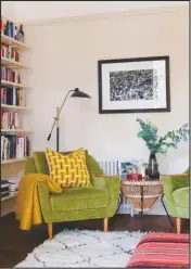  ??  ?? SITTING ROOM ‘Green was a strong theme in our mood boards. It’s so calming and connects with the garden,’ says Jason.
Mid-century lounge chairs, £764 for the pair; mid-century rattan Franco Albini coffee table, £395; mid-century sideboard, £595, all Mustard Vintage. Chartreuse Kashmiri Crewel cushions, £80 each, Samarkand Design. Cooper mirror, £395; Allis chandelier, £565, both Soho Home. Spring/black/autumn Cherry Tree prints, £130 each, Rachel Busch