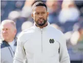  ?? PAUL SANCYA/AP ?? Notre Dame defensive coordinato­r Marcus Freeman was promoted to head coach following the sudden departure of Brian Kelly to LSU.