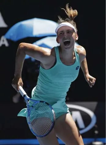  ?? DITA ALANGKARA/THE ASSOCIATED PRESS ?? Elise Mertens, ranked 35th in the world, celebrates after advancing to the semifinals of the Australian Open, the season’s first Grand Slam, in Melbourne: “I’ve got nothing to lose, that’s for sure.”